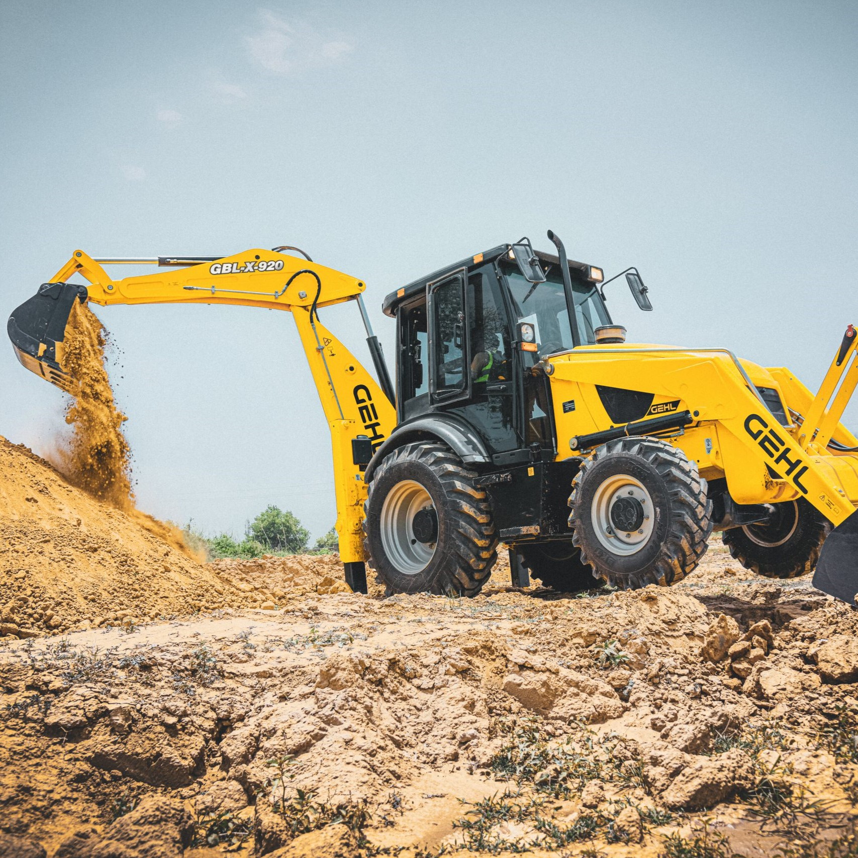 Operate a backhoe/loader